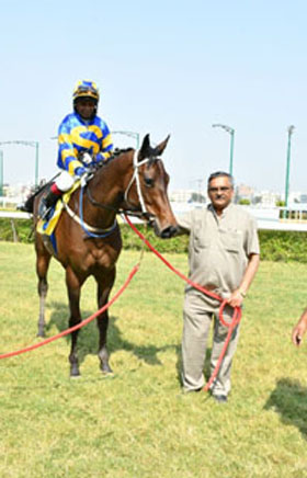 Horse owner N Shyam Sunder leading in Dubai Touch (Neeraj Rawal), winner of Royal Calcutta Turf Club Cup (Div I) at Hyderabad on Sunday.